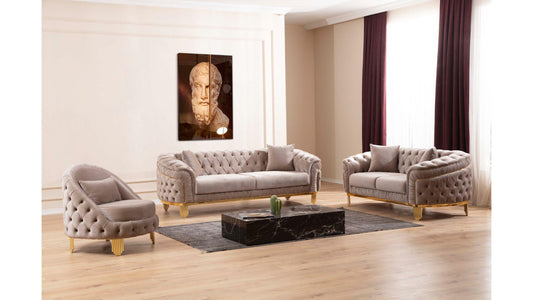 Gray sofa set in a living room with a marble coffee table and decorative elements.